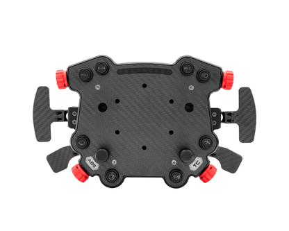 A top view of the Simagic GT Pro Hub featuring a carbon fiber plate, aluminum housing, and multiple control buttons and switches.
